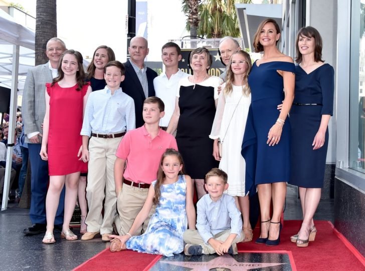 Despite the hilarious disaster they experience every time, Garner says she'll continue taking pictures with her kids every year.