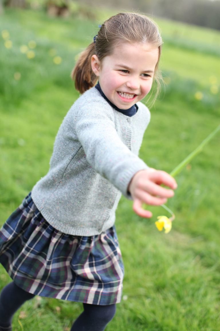 Princess Charlotte graced the public with her gorgeous smiles as she played on the garden before her birthday celebration.